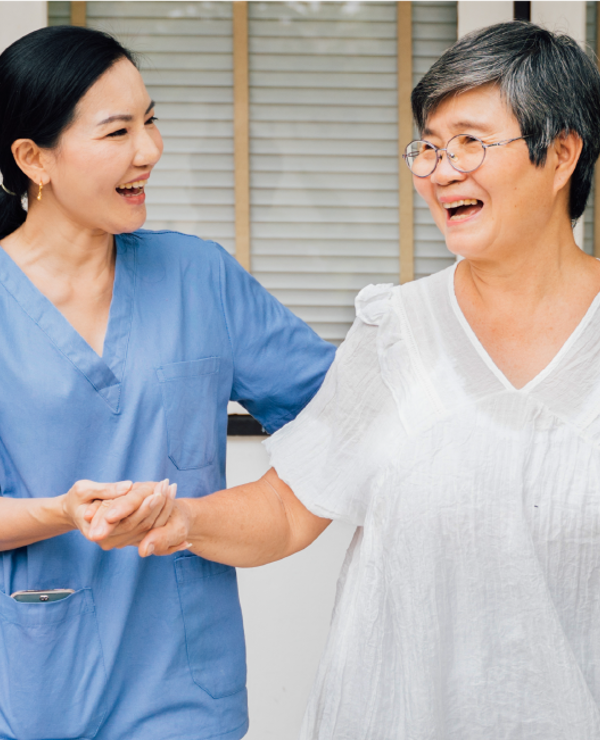 nurse helping someone walk