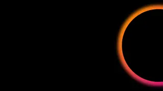 Orange circular glow on a black background