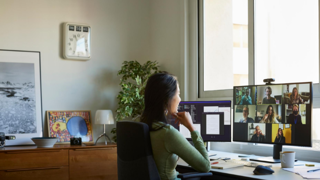 Female employee working from home on zoom call