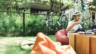 Two individuals enjoying tea outside