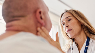 Doctor examining patient in hospital 