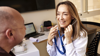 Doctor with stethoscope in ears