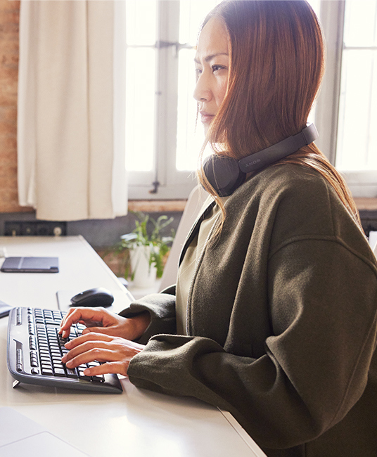 A woman working at a computer