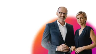 Smiling man and woman standing on white background with orange, pink and purple half circle graphic