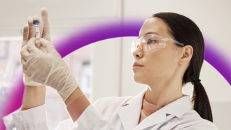 Woman researcher examining a sample