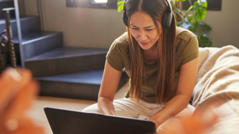 Photo of someone working from their laptop at home