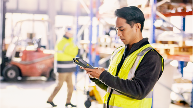 Warehouse worker scanning orders